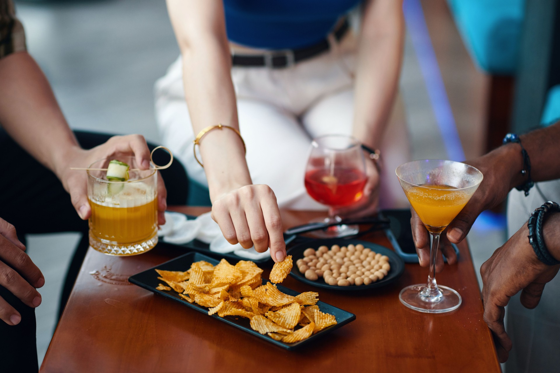 People Having Drinks and Appetizers